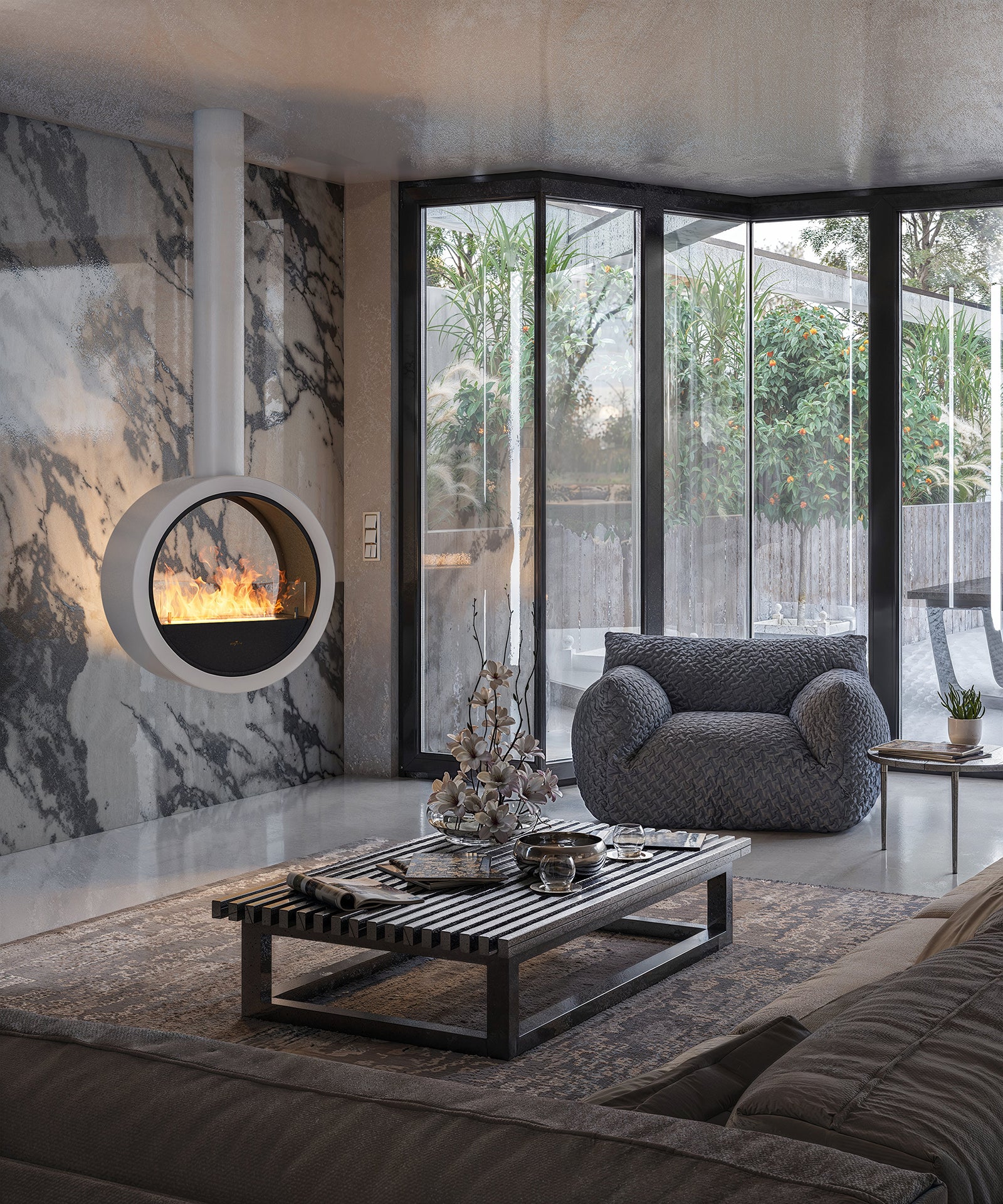 bioethanol-haengekamin-deckenmontage-incycle-infire-weiss-rund-mit-glas-mit-flammen-vor-marmorwand-in-luxurioesen-wohnzimmer-mit-glasfront-neben-holztisch
